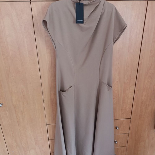 Beige dress with high neck by Christina Kontova new with belt