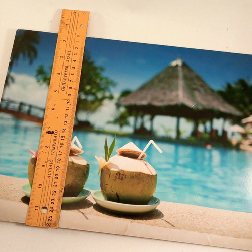 Wooden frame used with tropical pool and coconut motif