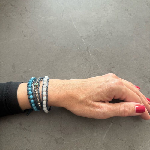 Leather bracelet like new with beads and blue evil eye detail