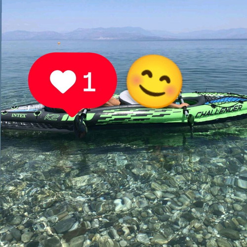 Index two-seat canoe with 2 paddles and pump like new