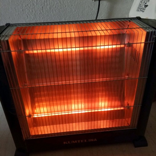 Kumtel heater like new with burnt middle lamp 1800 W