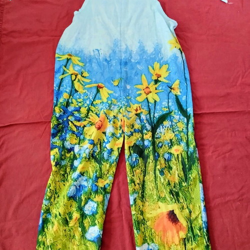 One-piece jumpsuit with straps used, size XL