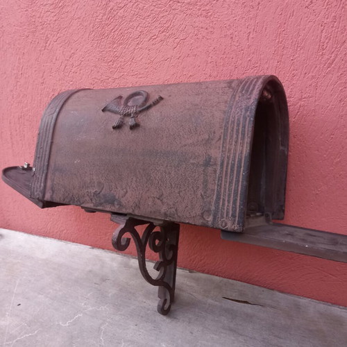 Cast iron mailbox used with metal base for wall or pole mounting
