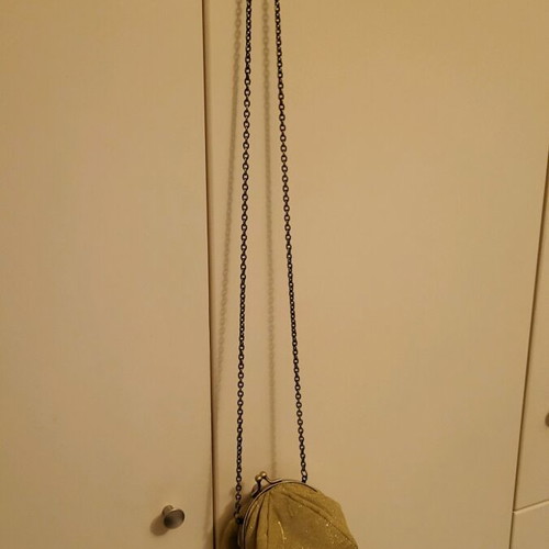 Gold shoulder bag with gold chain