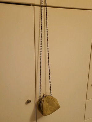 Gold shoulder bag with gold chain