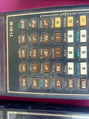 Texas Instruments programmable computers used with chargers