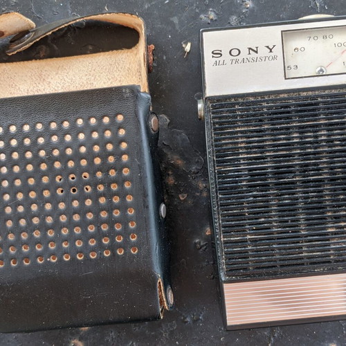 Sony TR-610 transistor radio used with leather case