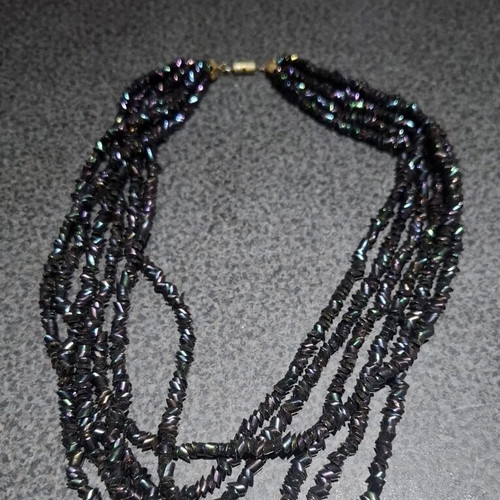 Torsade necklace used with iridescent carnival glass beads, 50cm