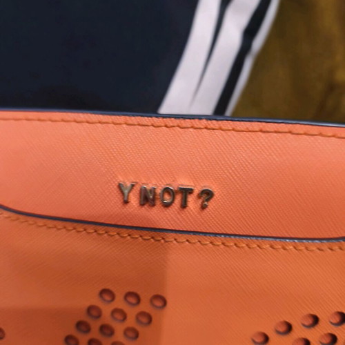 Y Not? Handbag like new, orange envelope with strap and keychain