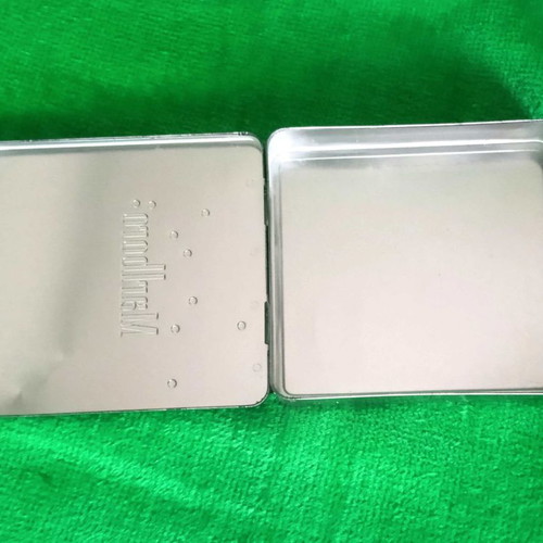 Marlboro pack used with metal cigarette case and lighter holder