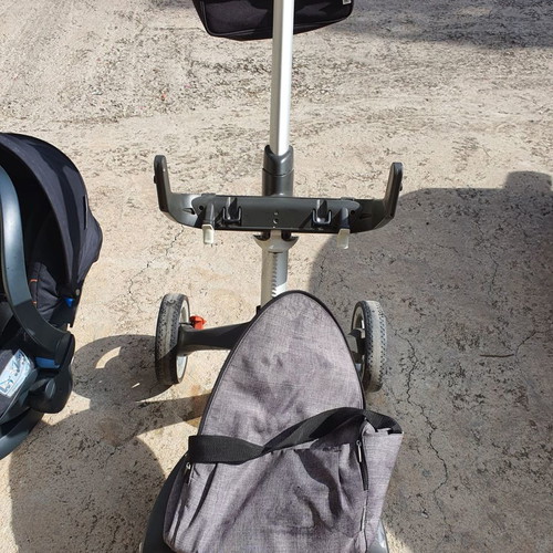Stokke Xplory stroller used with port bebe, footmuff, bag, umbrella, mosquito net, rain cover