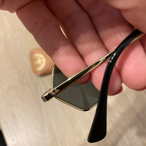 Ray Ban sunglasses like new, gold with unique shape