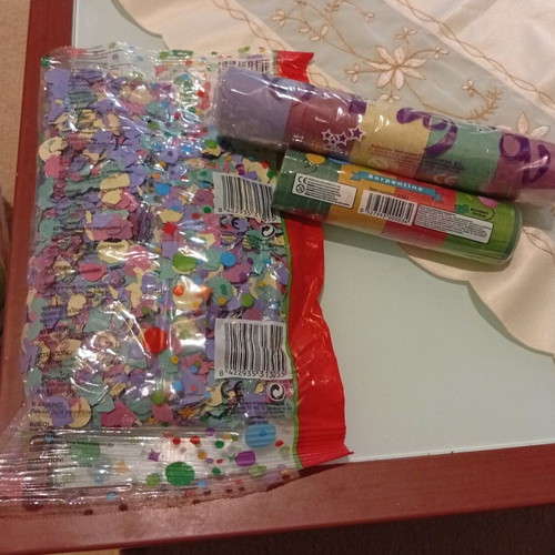 Confetti and streamers new, sealed packages