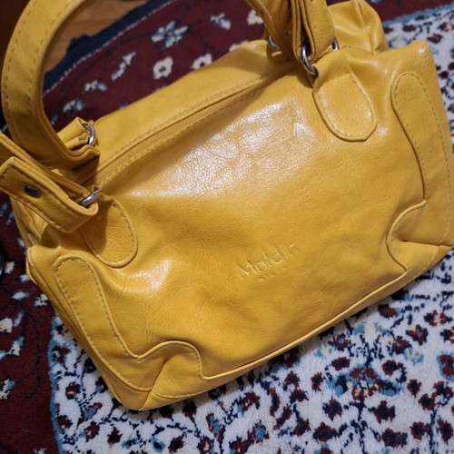 Women's mustard small hand bag used