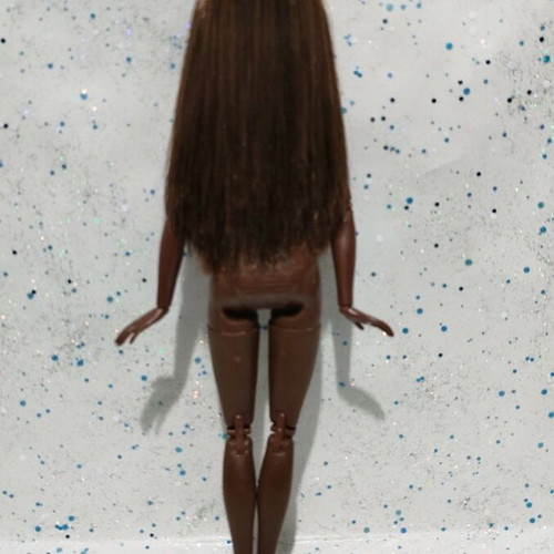 Barbie Made to Move African-American doll used with small flaws