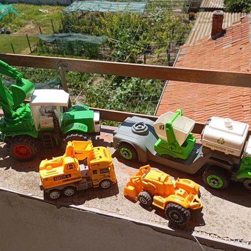 Children's construction and specialized toy trucks set of 4 used