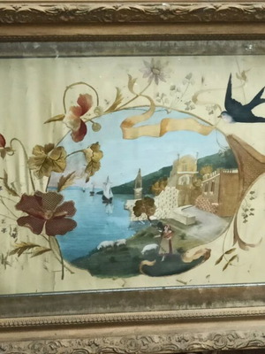 Prewar silk embroidery in frame with wear marks