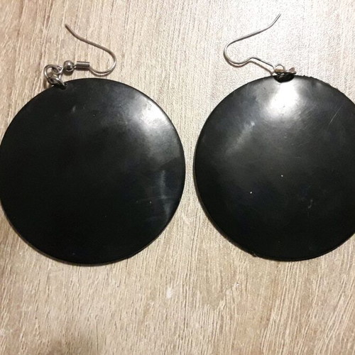 Earrings used, plastic material