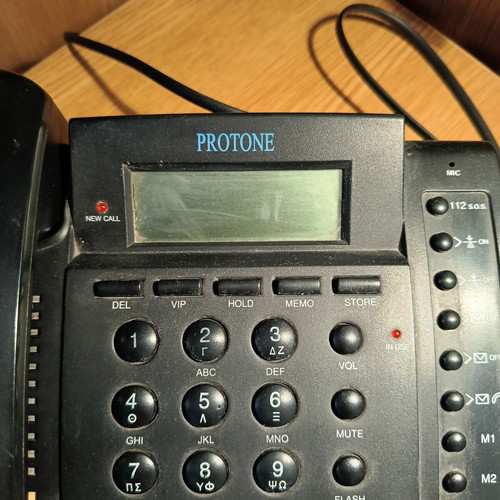 Protone black corded phone used, fully functional, 19x16 cm