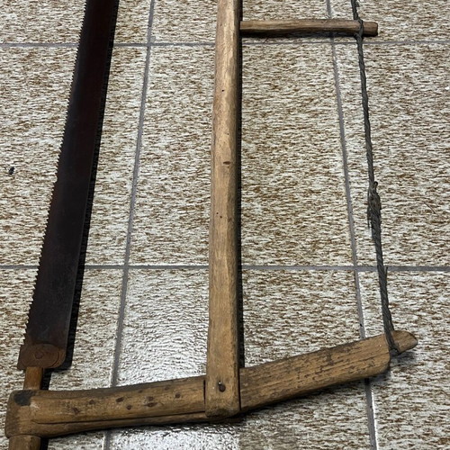 Old saw used from 1920-30 era museum piece