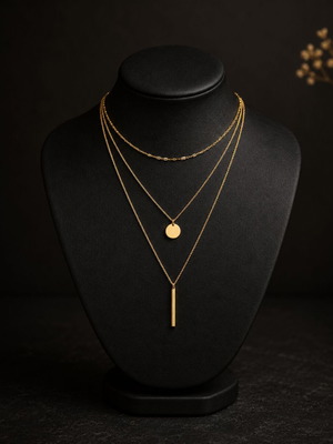 Exis Jewellery gold layered necklace with 3 chains, round and bar pendants