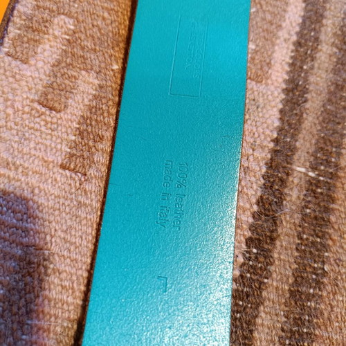 Three Benetton belts used, two leather and one fabric