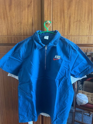 Nike zip in like new condition, two together, size L, white and blue