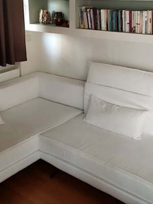 Elegant sofa white like new with adjustable recline mechanisms