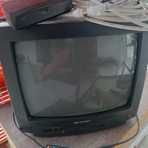 Sharp 16-inch TV used with decoder