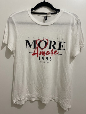H&M white t-shirt with black and red print, size S