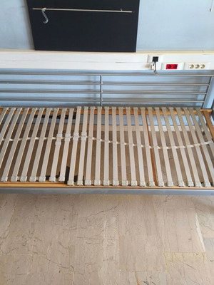 Metal single bed with reclining mechanism and mattress, like new