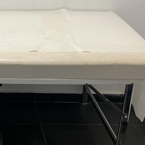 Folding examination bed for aesthetic treatments and massage