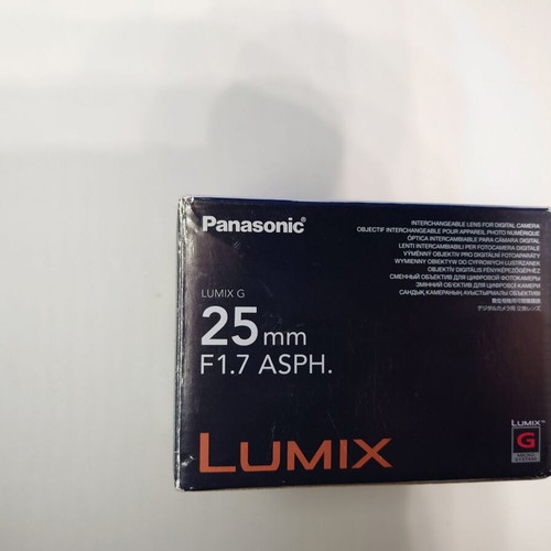 Empty box and manuals for Panasonic Lumix-G 25mm f/1.7 ASPH lens used