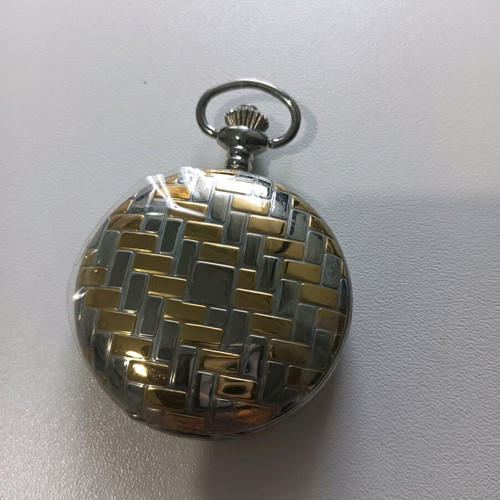 Collectible pocket watch like new in silver and gold tones