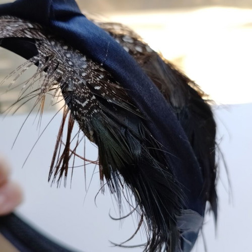 Blue women's headband with feathers used