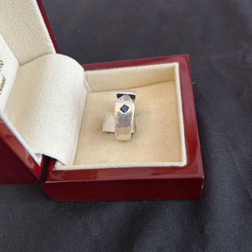 Silver 950 ring used with white and blue stone