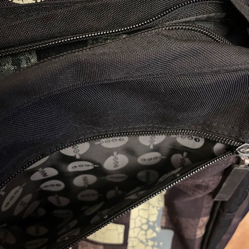 School bag used LYC SAC black and white with large compartments and two zippers