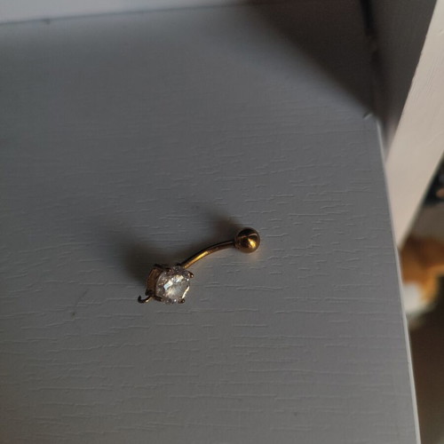Navel piercing in gold color like new with rhinestone