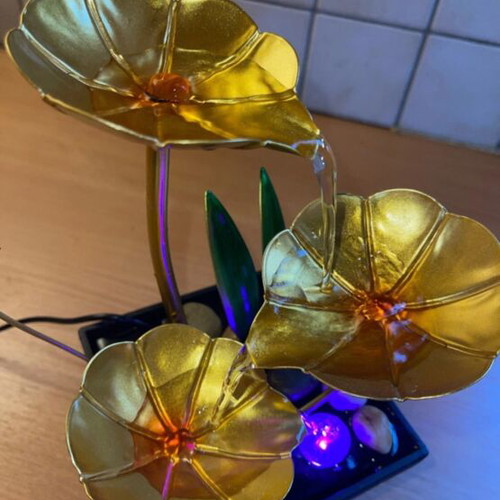 Indoor fountain with LED lighting and stones
