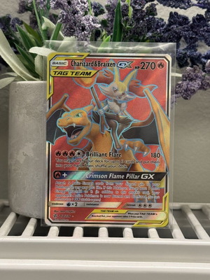 Charizard & Braixen GX card like new