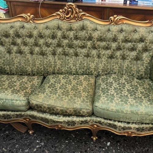 Loui vintage sofa from the 60s used with green floral fabric