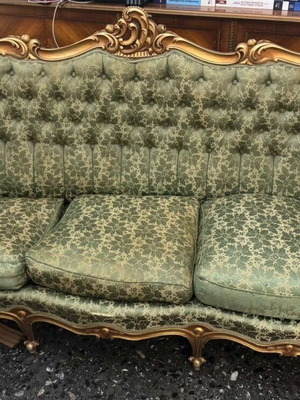 Loui vintage sofa from the 60s used with green floral fabric