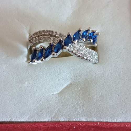 Ring new, gold plated with blue and silver zircon stones, size 7