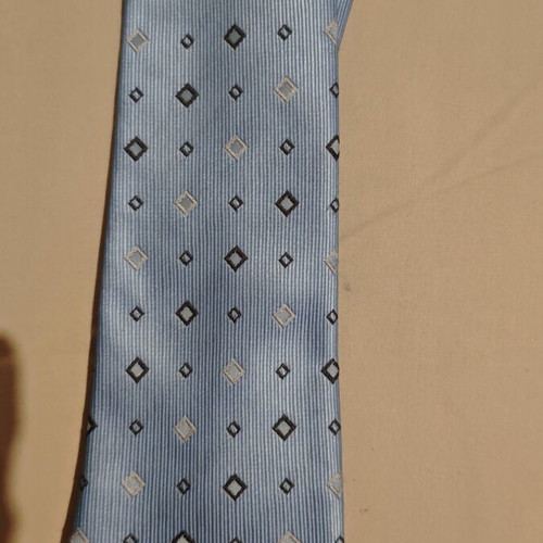 Children's tie light blue with diamond patterns like new