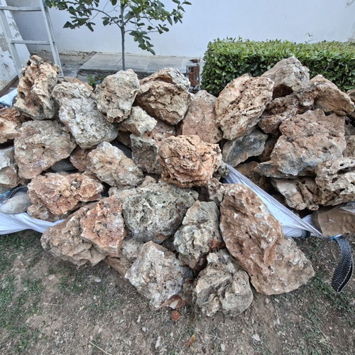 Decorative stones with holes used for waterfalls and rock gardens