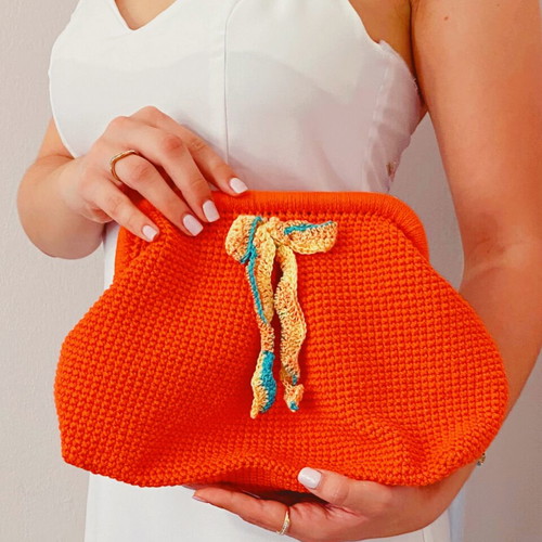 Handmade knitted clutch bag orange with metal frame