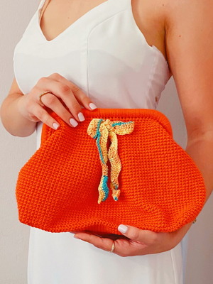 Handmade knitted clutch bag orange with metal frame