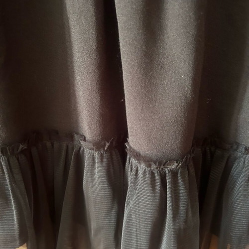 Women's blouse like new, black with tulle ruffles