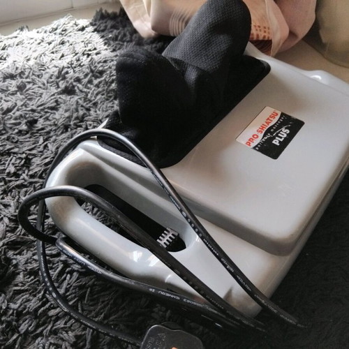 Shiatsu massager for neck and shoulders used
