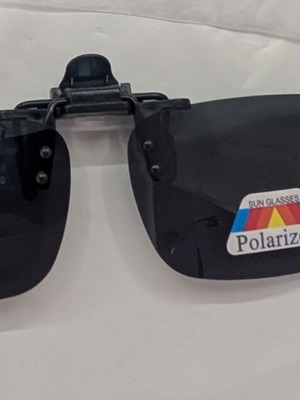 Polarized clip-on sunglasses lenses, black, 135mm